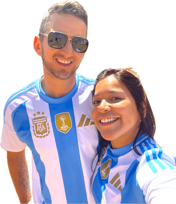 Ori and her husband in Argentina football shirts